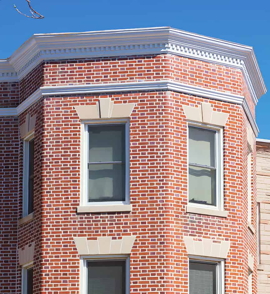 Historic brick building with detailed masonry work and clean tuckpointing.