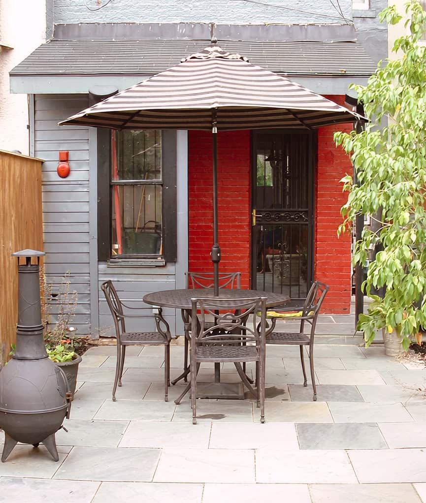 Freshly redone patio with table and chairs