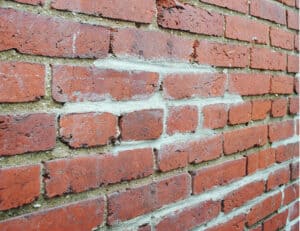 Close-up of historic brick masonry with tuckpointing work.