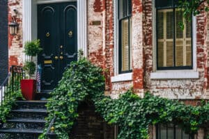 Historic Washington, DC rowhouse with an exposed brick façade, original masonry, and front stoop.