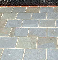 Restoration of historic masonry and tuckpointing on a brick building. Expert craftsmanship in preser.