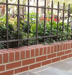 Restoration of historic brick masonry with detailed tuckpointing and masonry work.
