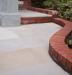 Historic brick and stone masonry work with detailed tuckpointing.