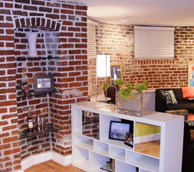 Interior view showcasing historic brick masonry and tuckpointing work.