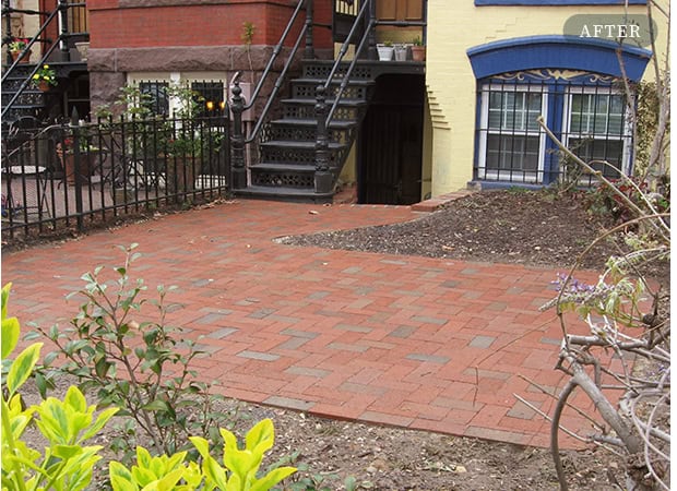 Restored historic masonry and tuckpointing on a residential building's exterior.