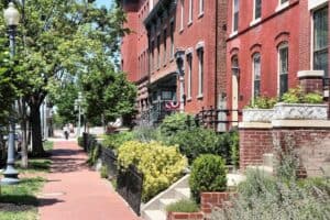 Historic brick row houses with detailed masonry work and well-maintained facades.