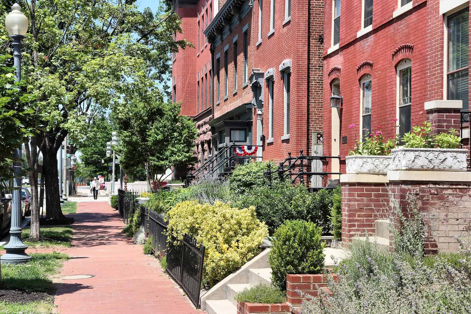 Historic brick row houses with detailed masonry work and well-maintained facades.