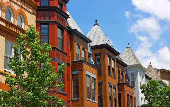 Historic masonry and tuckpointing on Renaissance-style buildings with colorful brick facades.