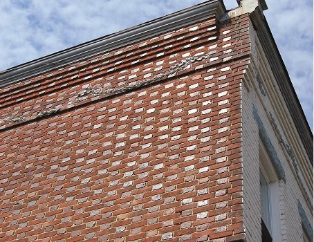 Close-up of brick masonry and tuckpointing on historic building.