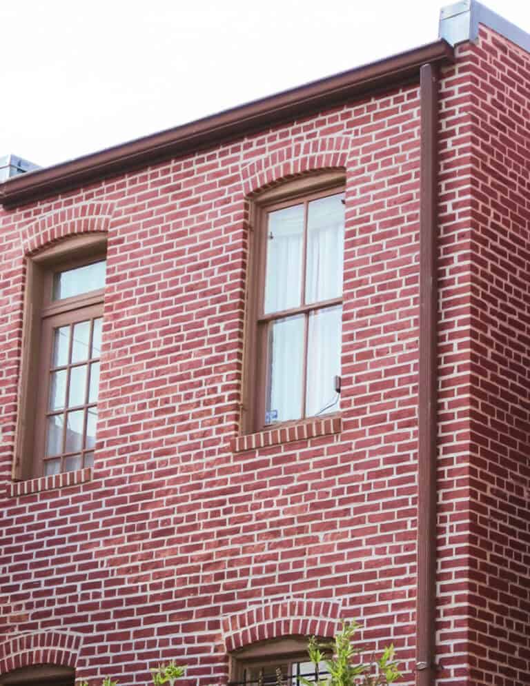 Renaissance Development Brick Masonry Restoration Historic brick masonry and tuckpointing on a Renaissance-style building facade.