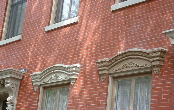 Historic brick building with detailed masonry and tuckpointing work.