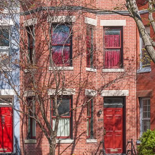 Historic brick building with masonry and tuckpointing work by Renaissance Development.