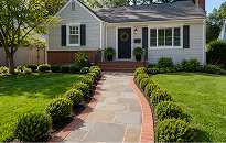 img-slider 04 Curved brick walkway leading to suburban home