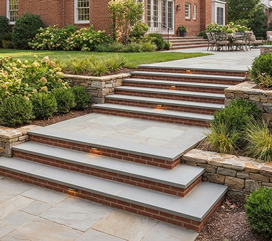 patio and walkways img 13 Stone patio steps with landscaped backyard and brick home